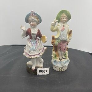 2 VNTG Figurines 1 Male  Orion